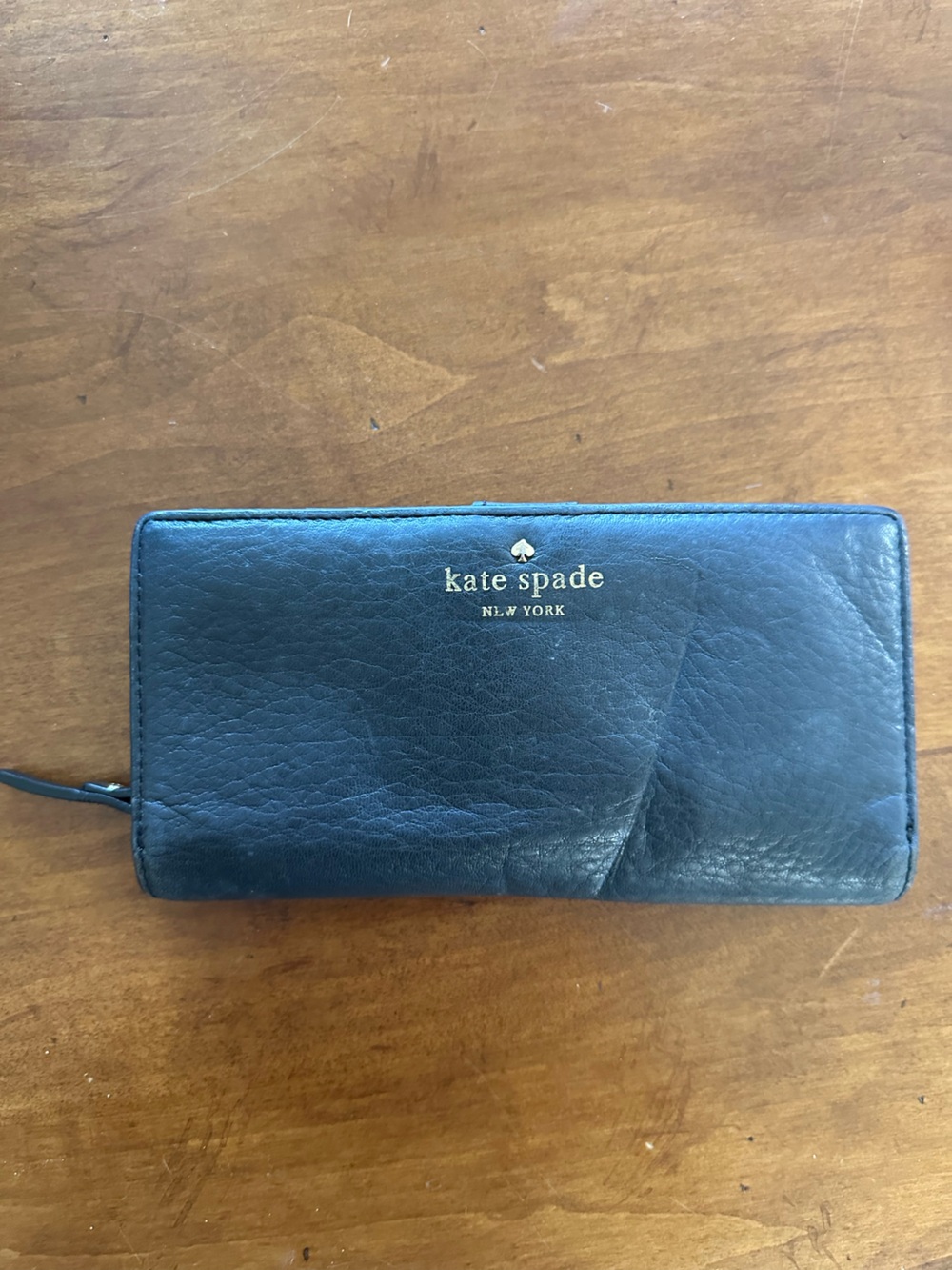 kate spade black leather zip-around wallet
